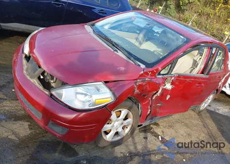 2007 Nissan Versa 1.8Sl z USA, uszkodzony, nr VIN 3N1BC11E47L424071